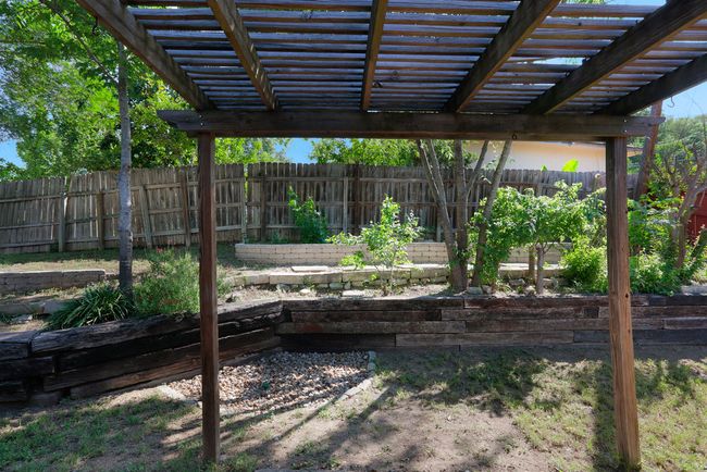 Fenced backyard with patio | Image 7