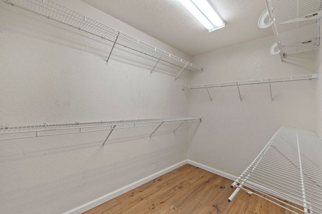 Spacious primary bedroom closet | Image 21