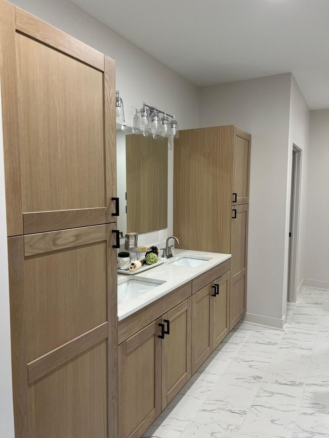 Primary bathroom vanity with double sinks and plenty of storage! | Image 9