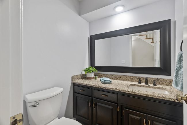 Main floor ceramic tile floor bath. | Image 19
