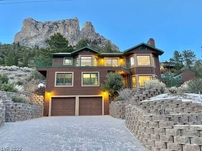 This exquisite Mt. Charleston home features a timeless mountain elegance. | Image 1