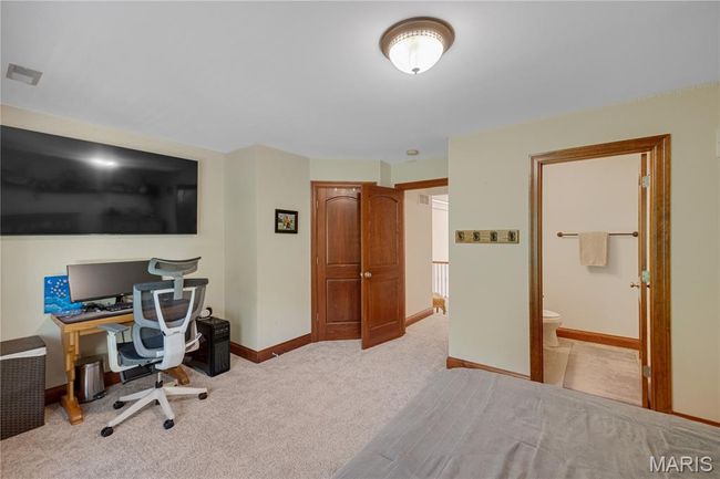Carpeted office featuring baseboards | Image 38