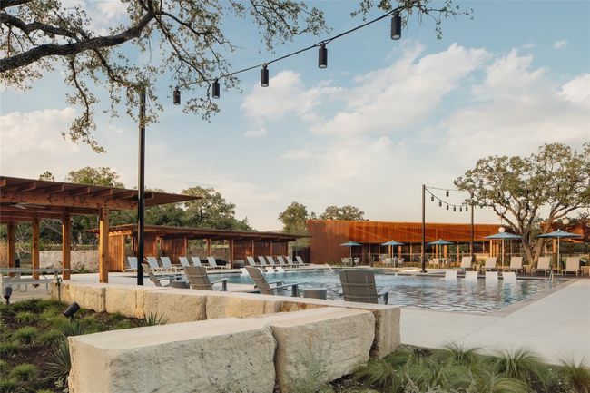 View of property's community with a swimming pool and a patio area | Image 37