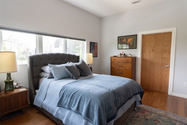 Bedroom featuring wood finished floors | Image 16