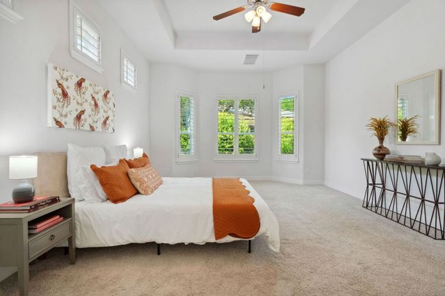 The primary suite is the perfect retreat, nestled at the back of the home for privacy. | Image 19