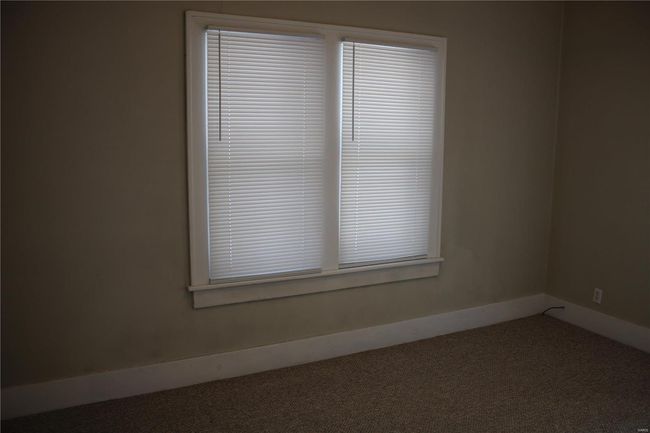 Unfurnished room with carpet and baseboards | Image 8
