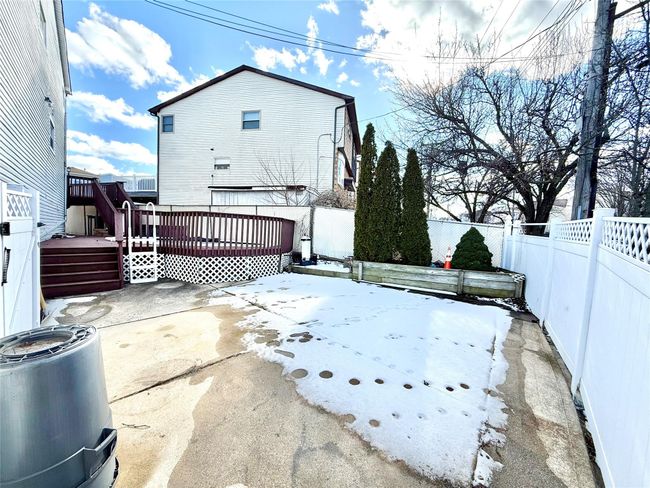 View of patio / terrace featuring a wooden deck | Image 16