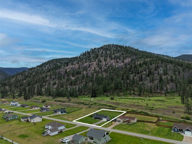 View of mountain background featuring a heavily wooded area | Image 65
