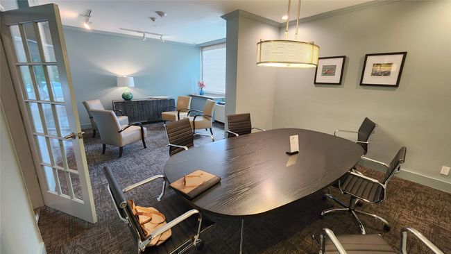 Comfortable conference room is adjacent to the main lobby. | Image 20