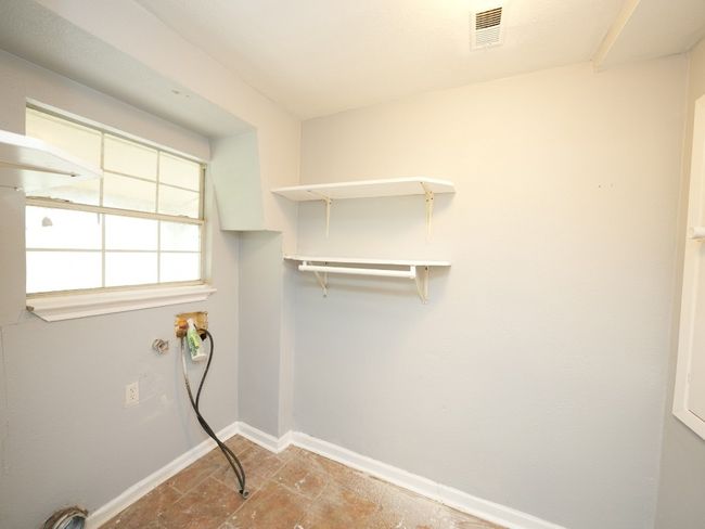 Washroom featuring washer hookup and baseboards | Image 14