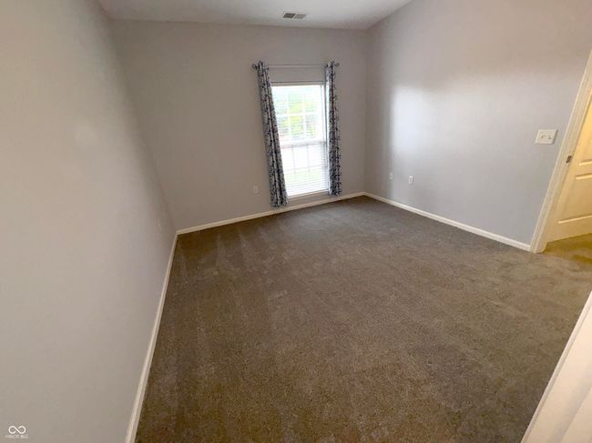 Primary Bedroom on Ground Level with New Carpeting | Image 8