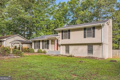 139 Old Mill Trail Sw, House other with 3 bedrooms, 2 bathrooms and 2 parking in Conyers GA | Image 1