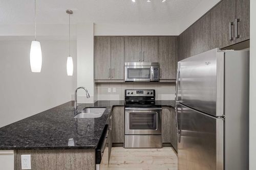205-402 Marquis Lane Se, Calgary, AB, T3M1M6 | Card Image