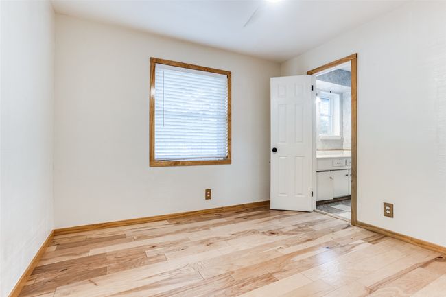 Spare room featuring light wood-style flooring and baseboards | Image 34