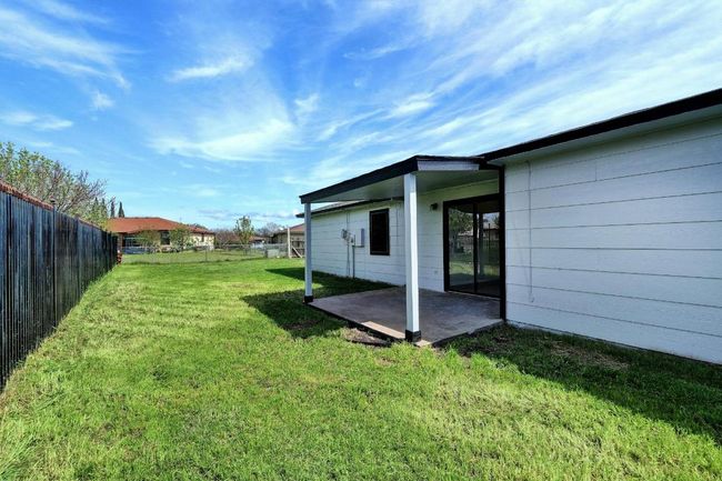 View of yard featuring a patio | Image 23