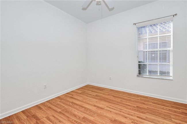 Unfurnished room featuring ceiling fan and light hardwood / wood-style floors | Image 13