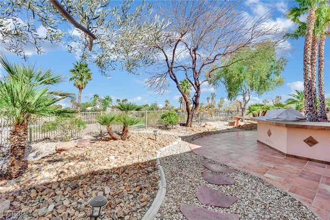 View of yard featuring a patio area, exterior kitchen, and a fenced backyard | Image 35