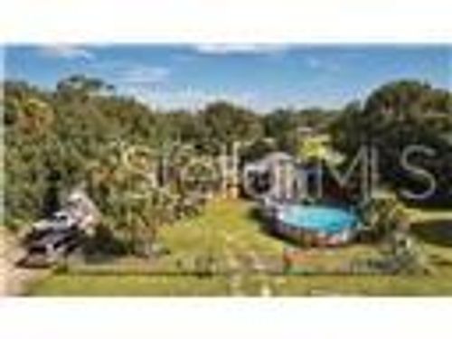 1106 Charles St, MOORE HAVEN, FL, 33471-5603 | Card Image