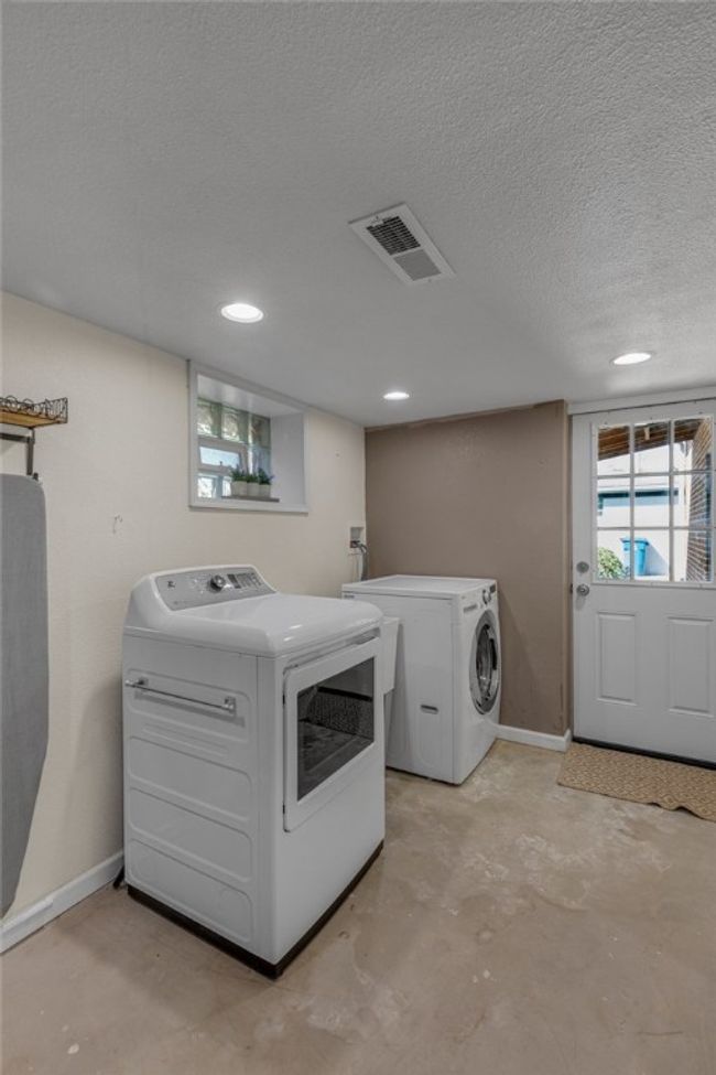 Laundry room also enters to the back porch. | Image 30