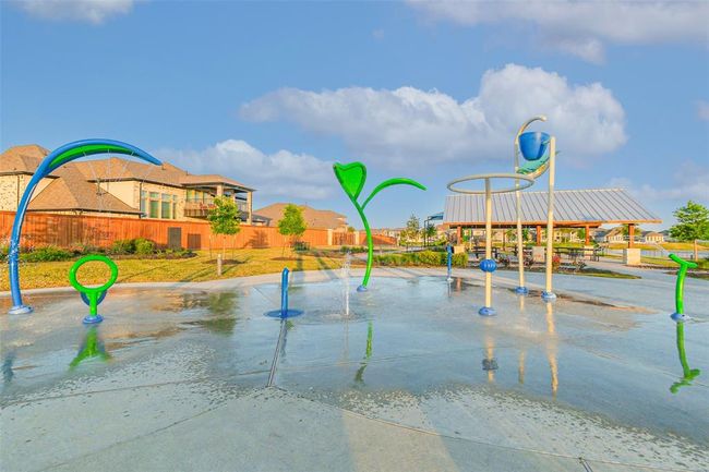 The splash pad at Marina Bay Park is one of Towne Lake’s many play areas and is walking distance from the house. | Image 35