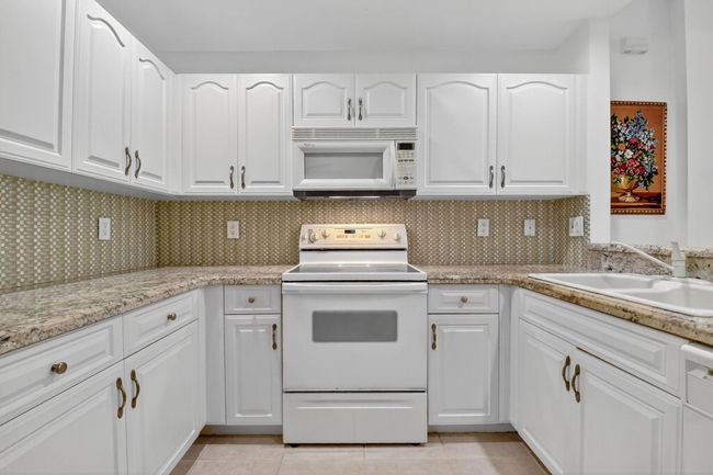 UNIT-101 - 12447 Crystal Pointe Dr, Condo with 3 bedrooms, 2 bathrooms and null parking in Boynton Beach FL | Image 23