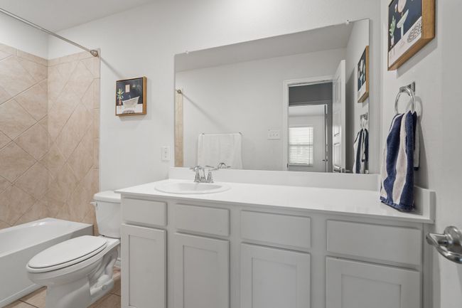Bathroom on Second Floor with vanity, toilet, tub / shower combination, and tile Tile flooring | Image 29