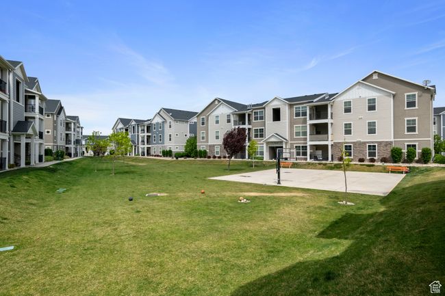 View of community with a residential view and a yard | Image 17