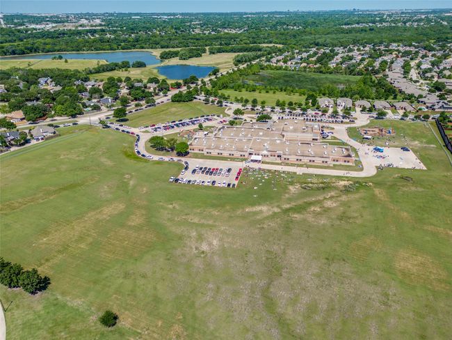 View of elementary school a huge park with fishing ponds in walking distance from the home. | Image 30