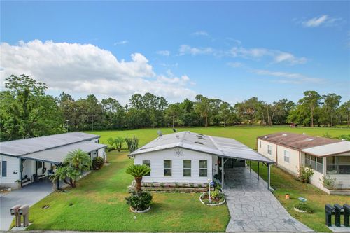 6518 Raintree Ln Ne, WINTER HAVEN, FL, 33881-9697 | Card Image