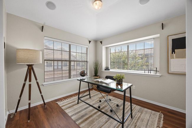 Office area or second bedroom with vinyl wood floors and high ceilings | Image 27