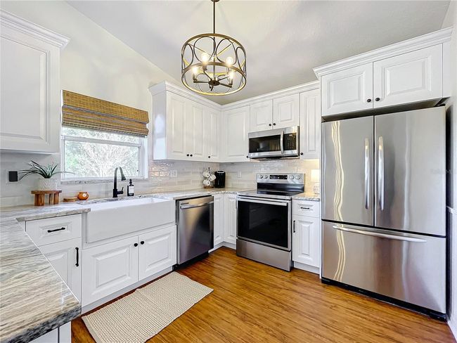 865 Scenic View Cir, House other with 3 bedrooms, 2 bathrooms and null parking in Minneola FL | Image 13