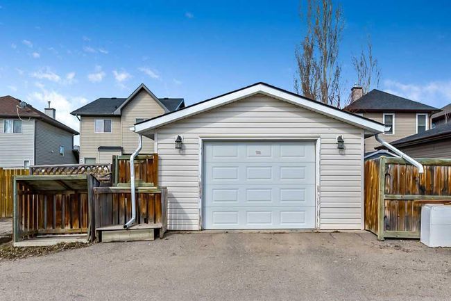 89 Crystal Shores Crescent, Home with 3 bedrooms, 2 bathrooms and 1 parking in Okotoks AB | Image 31
