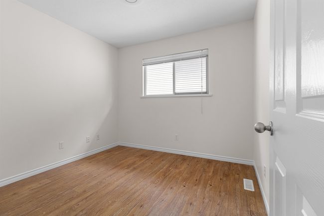 Unfurnished room with light wood-style flooring and baseboards | Image 21