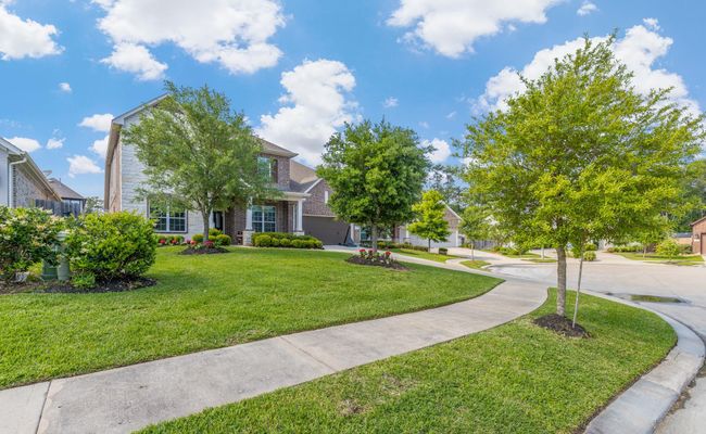This beautiful two-story home is perfectly situated on a peaceful cul-de-sac, offering curb appeal, comfort, and a welcoming atmosphere—ideal for family living and entertaining. | Image 6