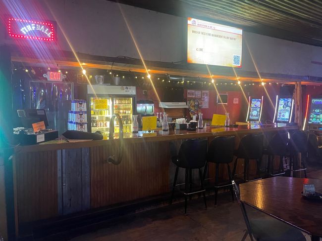 Community bar area with concrete flooring | Image 6