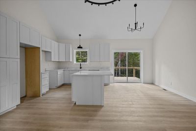 Vaulted Ceilings, Quartz Countertops, Shaker Cabinets, Wood Floors | Image 2