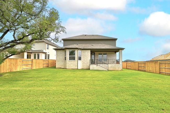 Rear view of house with roof with shingles | Image 34