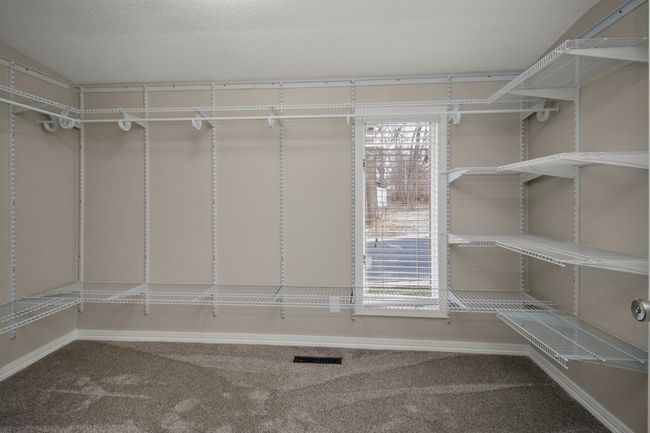 Large primary bedroom closet | Image 21
