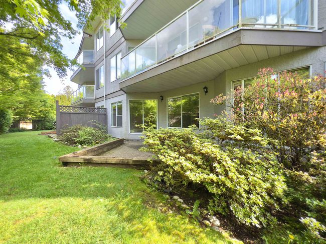 Back of property featuring stucco siding | Image 15