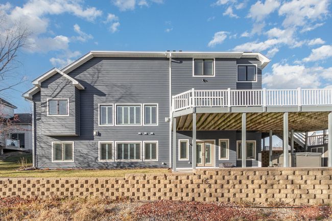 Hot tub/patio and deck overlooking pond | Image 45