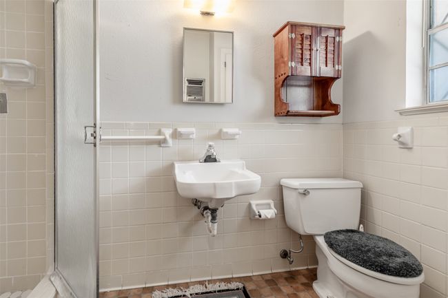 Third bathroom off of kitchen and garage | Image 19