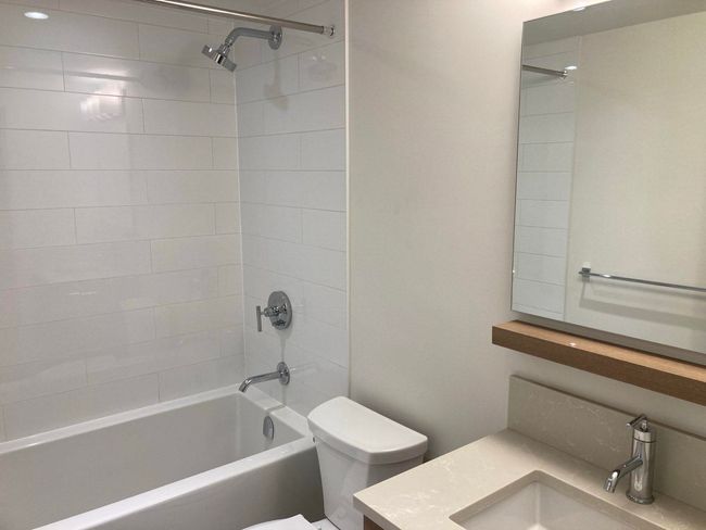 Bathroom featuring shower / bath combination, vanity, and toilet | Image 29