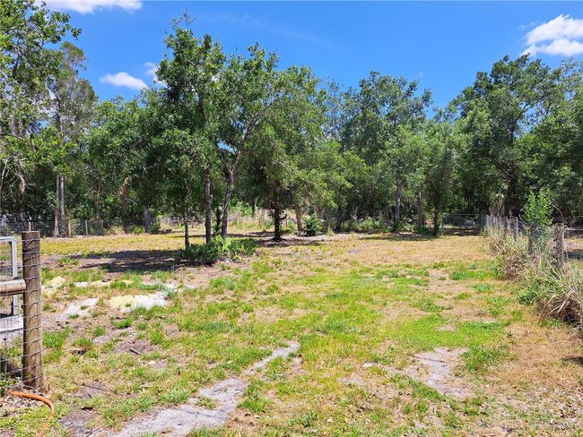 Extra land included in this lease. If you have work trucks or toys, they are allowed and can be kept behind the secured fencing. | Image 27
