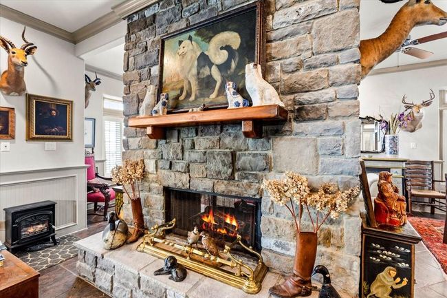 Double sided fireplace is great for relaxing and enjoying the gorgeous cool evenings on the bay, no matter the time of year. | Image 11