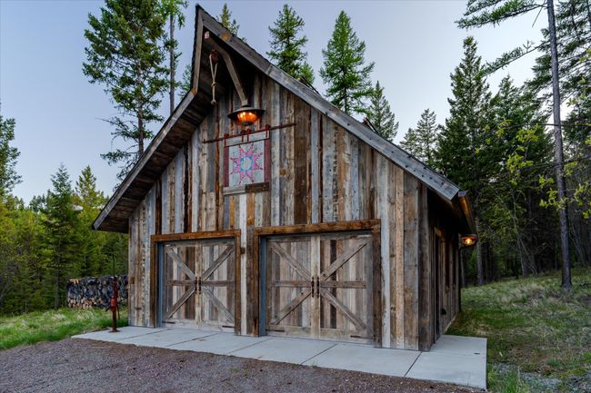Alongside the Farmstead is a 28x28 2 bay garage | Image 45