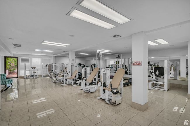 Gym featuring light tile patterned flooring | Image 21