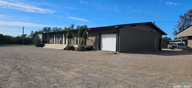 View of front of property featuring driveway and a garage | Image 12