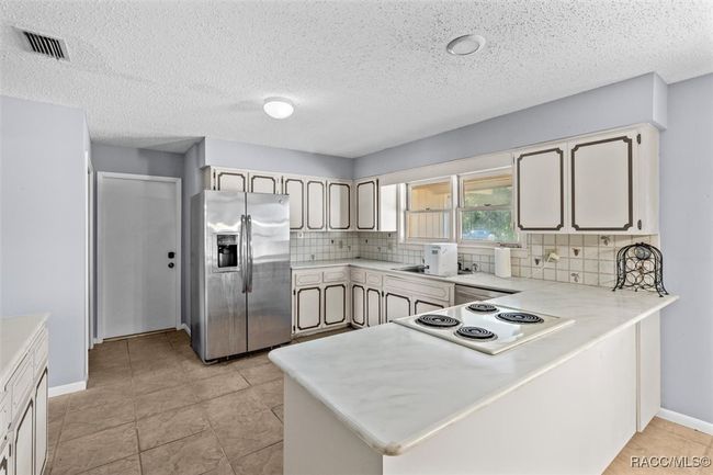 809 N Golf Course Dr, House other with 3 bedrooms, 2 bathrooms and 3 parking in Crystal River FL | Image 10