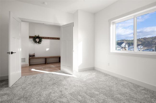 Unfurnished bedroom featuring carpet and baseboards | Image 10