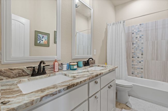 Full bath with double vanity and shower / bath combination with curtain | Image 20